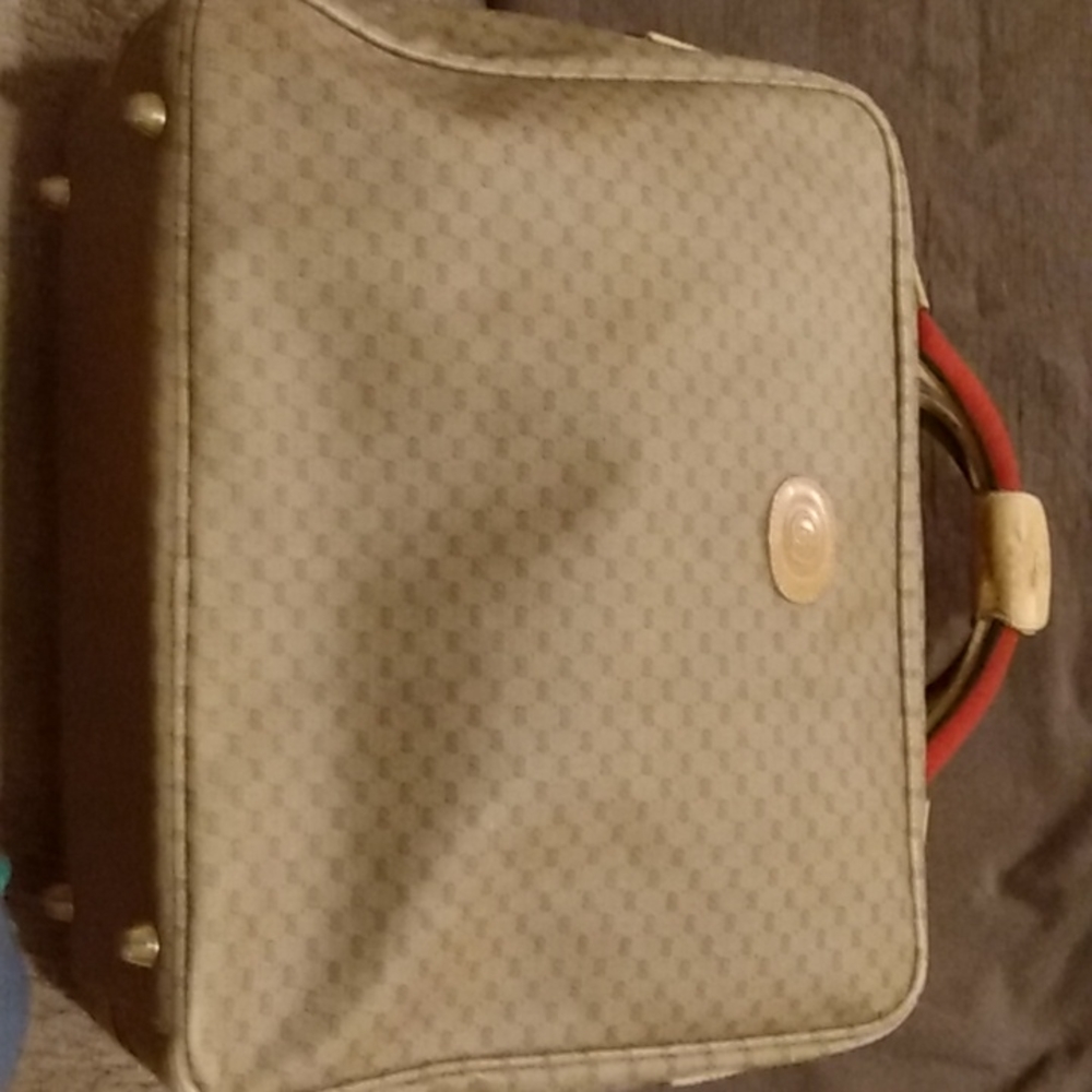 Vintage Gucci monogram vinyl canvas, carry on suit case.